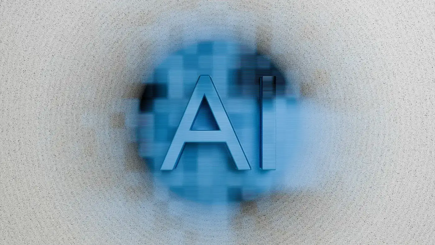 The letters AI glowing in blue on a soft background